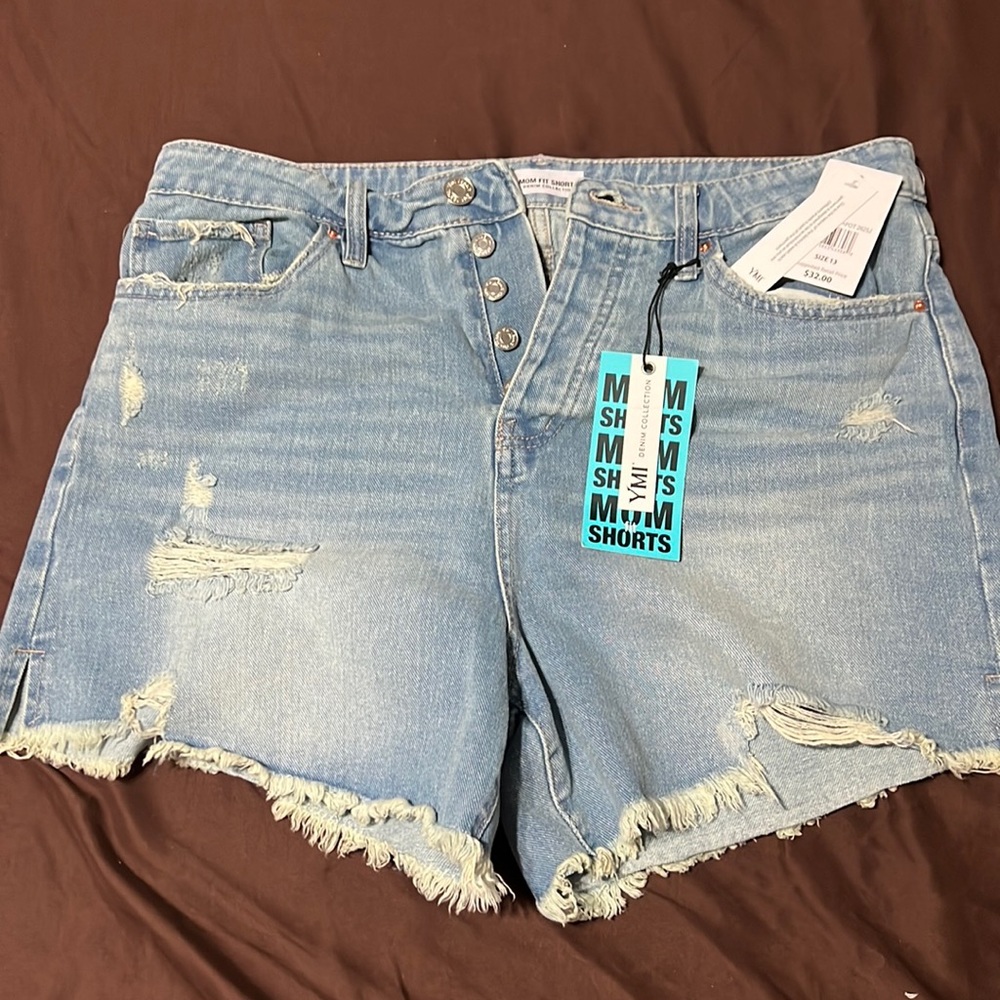 Denim shorts, not stretchy size 13 smaller fit.